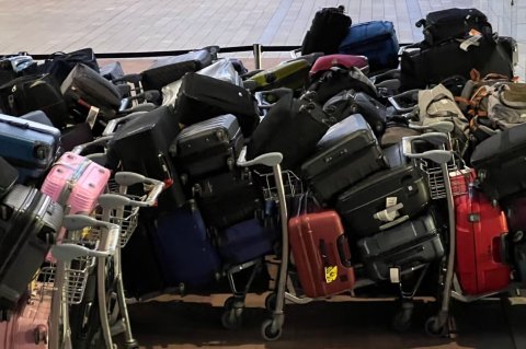 Baggage handling system failve London airport huttumakah hingajje