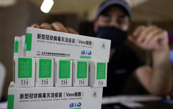 China in afganistan ah 400,000 doze ge vaccine dheny 