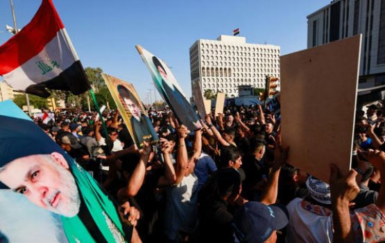 Quran endhumaa dhekolhah Baghdad gai bodethi muzahara thakeh 